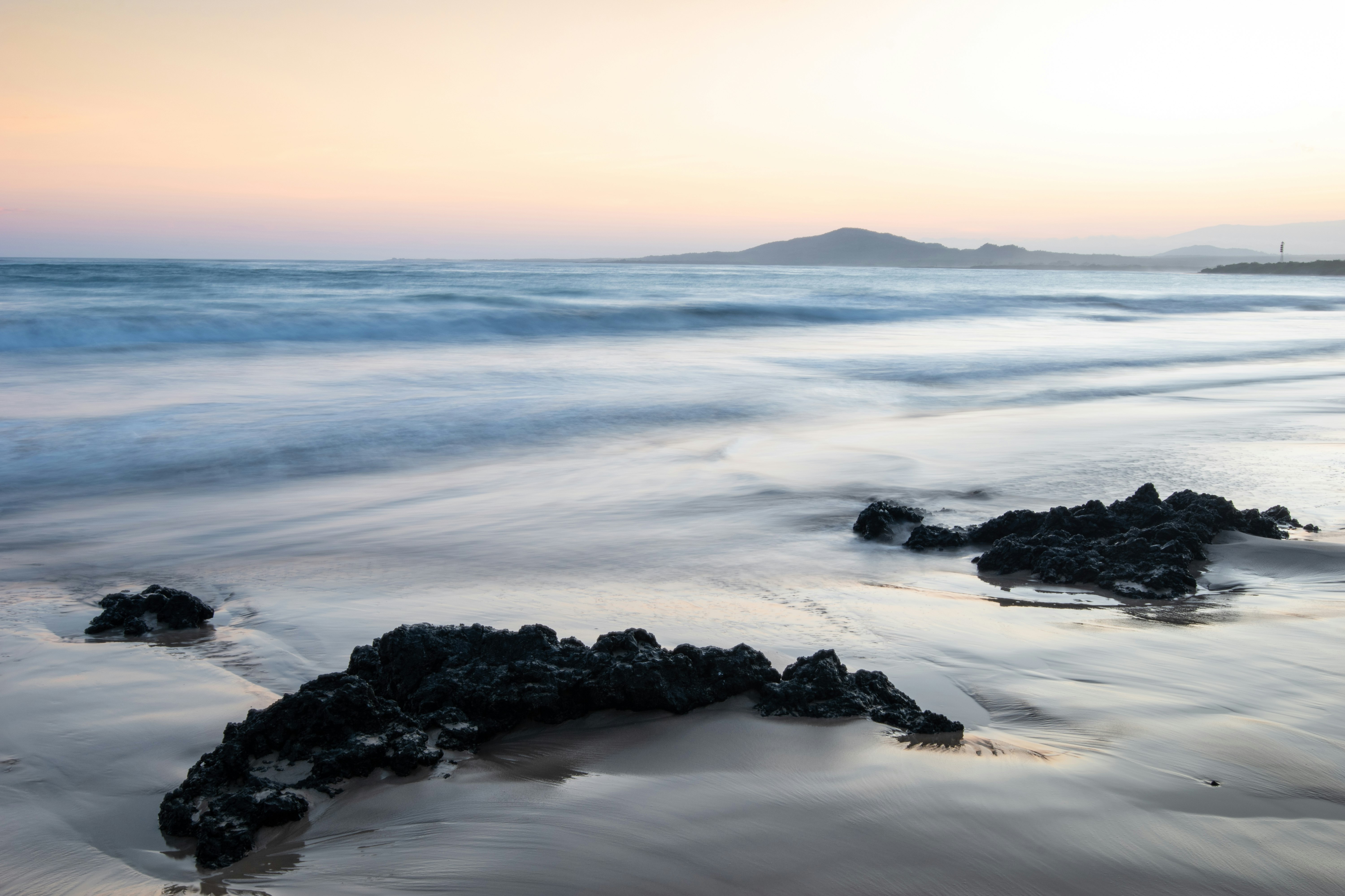 coastal rocks during daytime